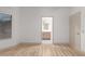 Bright empty bedroom with an ensuite bathroom and closet at 20301 N Queen Palm Ln, Surprise, AZ 85374