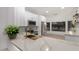 Modern kitchen features white cabinets, stainless steel appliances and quartz countertops at 20301 N Queen Palm Ln, Surprise, AZ 85374