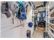 Large walk-in closet offering ample storage space with shelves and hanging racks at 20583 N Ryans Trl, Maricopa, AZ 85138