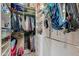 Large walk-in closet with custom shelves and storage solutions for organization at 20583 N Ryans Trl, Maricopa, AZ 85138