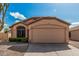 Charming single-story home featuring a two-car garage and well-maintained landscaping at 21819 N 48Th St, Phoenix, AZ 85054