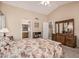 Cozy primary bedroom with vaulted ceiling, and attached bathroom at 21819 N 48Th St, Phoenix, AZ 85054