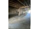 View of an unfinished interior with exposed framing and concrete floors at 2230 N Laurel Ave, Phoenix, AZ 85007