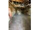Unfinished interior with exposed studs and beams in a home undergoing renovation at 2230 N Laurel Ave, Phoenix, AZ 85007