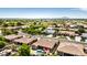 An aerial view of a neighborhood with a pool in the backyard at 2476 E Marlene Dr, Gilbert, AZ 85296