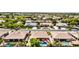 An aerial view of a neighborhood with a pool in the backyard at 2476 E Marlene Dr, Gilbert, AZ 85296