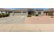 Charming single-story home featuring a two-car garage and desert landscaping for low maintenance at 2476 E Marlene Dr, Gilbert, AZ 85296
