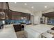 Modern kitchen with a large island, stainless steel appliances, and beautiful countertops at 2476 E Marlene Dr, Gilbert, AZ 85296
