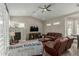 Comfortable living room featuring a fireplace and media center for relaxation at 2476 E Marlene Dr, Gilbert, AZ 85296