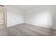 A simple bedroom has sliding closet doors, carpeted floors, and neutral paint at 2741 E Sweetwater Ave, Phoenix, AZ 85032