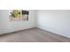 Cozy bedroom featuring neutral carpet, natural light and a fresh, neutral paint scheme at 2741 E Sweetwater Ave, Phoenix, AZ 85032