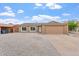 Charming single-story home with a two car garage and low maintenance gravel landscaping at 2741 E Sweetwater Ave, Phoenix, AZ 85032
