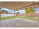 Covered patio featuring decorative pavers and green grass at 2741 E Sweetwater Ave, Phoenix, AZ 85032