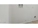 A utility room wall has hookups for a washer and dryer and electrical outlets at 2741 E Sweetwater Ave, Phoenix, AZ 85032