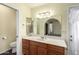 Updated bathroom features a modern vanity with elegant countertops and a large mirror at 2816 S Don Luis Cir, Mesa, AZ 85202
