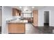 Spacious kitchen boasts tile flooring, updated countertops, and functional layout at 2816 S Don Luis Cir, Mesa, AZ 85202