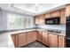 Modern kitchen features updated appliances, granite countertops, and ample cabinet space at 2816 S Don Luis Cir, Mesa, AZ 85202