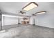 Open concept living room featuring tile flooring and a view of the modern kitchen at 2816 S Don Luis Cir, Mesa, AZ 85202