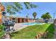 Backyard featuring pool, patio and lush, well-maintained lawn at 3413 W Ocotillo Rd, Phoenix, AZ 85017