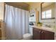 Traditional bathroom with shower and updated vanity and sink at 3413 W Ocotillo Rd, Phoenix, AZ 85017