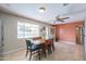Bright kitchen with a dining area and large window providing natural light at 3413 W Ocotillo Rd, Phoenix, AZ 85017
