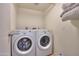 Laundry room with a washer and dryer and additional storage space at 3413 W Ocotillo Rd, Phoenix, AZ 85017