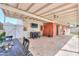 Spacious covered patio with brick and outdoor living space at 3413 W Ocotillo Rd, Phoenix, AZ 85017