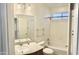 Bright bathroom featuring a vanity with light countertop and a shower over tub at 3435 E Amber Ln, Gilbert, AZ 85296