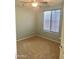 Neutral bedroom with natural light highlighting the carpet floors at 3435 E Amber Ln, Gilbert, AZ 85296