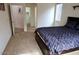Comfortable bedroom with carpet, natural light, and walk-in closet at 3435 E Amber Ln, Gilbert, AZ 85296