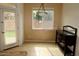 Bright dining area with tile floor and large window providing natural light at 3435 E Amber Ln, Gilbert, AZ 85296