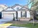 Charming single-Gathering home featuring a two-car garage, neutral paint, and well-maintained landscaping at 3435 E Amber Ln, Gilbert, AZ 85296