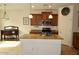 Charming kitchen featuring granite countertops, stainless steel appliances, and tile flooring at 3435 E Amber Ln, Gilbert, AZ 85296