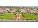 Aerial view of a neighborhood park with playground nestled in a well-maintained community at 3842 E Fountain St, Mesa, AZ 85205