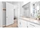 Light and airy bathroom with white cabinets, quartz counters, and modern fixtures at 3842 E Fountain St, Mesa, AZ 85205