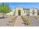 Beautiful Southwestern-style home with desert landscaping and inviting gated entry, perfect for curb appeal at 3842 E Fountain St, Mesa, AZ 85205