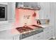 Close-up of a modern gas stovetop in a bright and clean kitchen setting at 3842 E Fountain St, Mesa, AZ 85205