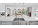 Spacious kitchen with modern appliances, a large island, and open layout at 3842 E Fountain St, Mesa, AZ 85205