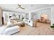Expansive living space showcasing a modern design, with seamless flow to the kitchen and dining areas at 3842 E Fountain St, Mesa, AZ 85205