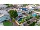 Lush backyard features a private pool, seating, and manicured landscaping, creating an ideal outdoor retreat at 3907 E Topeka Dr, Phoenix, AZ 85050