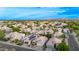 An aerial view of a residential area featuring single-Gathering homes with desert landscaping at 3907 E Topeka Dr, Phoenix, AZ 85050