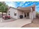 Backyard patio featuring a grill and outdoor seating with access to the house at 3907 E Topeka Dr, Phoenix, AZ 85050