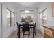 Cozy dining area with windows offering natural light and comfortable seating at 3907 E Topeka Dr, Phoenix, AZ 85050