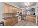 Spacious kitchen boasts stainless steel appliances, ample cabinetry, and granite countertops at 3907 E Topeka Dr, Phoenix, AZ 85050