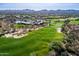 Gorgeous golf course, water features, and desert landscape viewed from above at 41424 N Club Pointe Dr, Anthem, AZ 85086