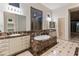 The bathroom has dual sinks, soaking tub, and large windows at 41424 N Club Pointe Dr, Anthem, AZ 85086