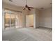 Bright, spacious bedroom with slider doors at 41424 N Club Pointe Dr, Anthem, AZ 85086