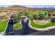 Welcoming community entrance with beautiful landscaping and golf course access at 41424 N Club Pointe Dr, Anthem, AZ 85086