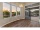 Dining area with large windows that offer spectacular views of the backyard at 41424 N Club Pointe Dr, Anthem, AZ 85086