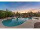 Backyard pool and spa offer a relaxing retreat with desert views at 41424 N Club Pointe Dr, Anthem, AZ 85086